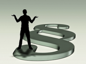 silhouette of man with arms up over a law section