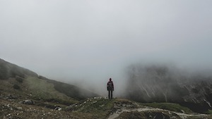 Backpacker, man overlooking mountain with fog pic by Pexels from Pixabay