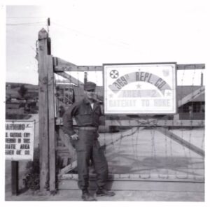 MSgt Daniel L Greer, US Army standing at gate in Korea